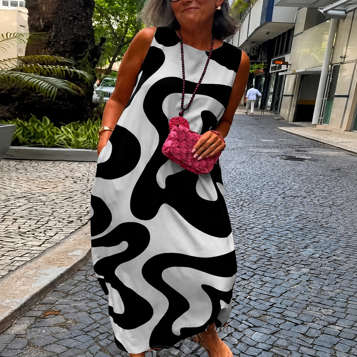Taylor - Elegantes ärmelloses Kleid mit geometrischen Mustern